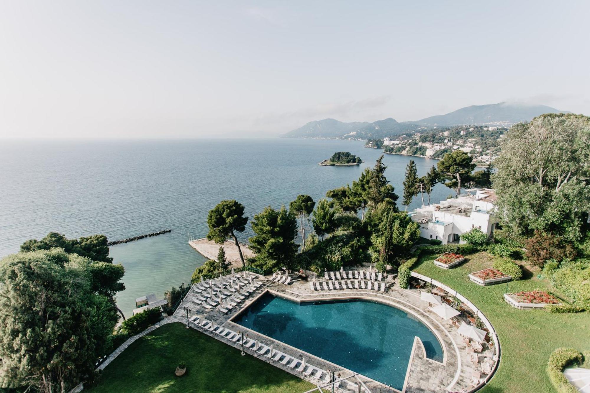 Corfu Holiday Palace Perama  Exterior photo The swimming pool at the Hotel du Cap-Eden-Roc