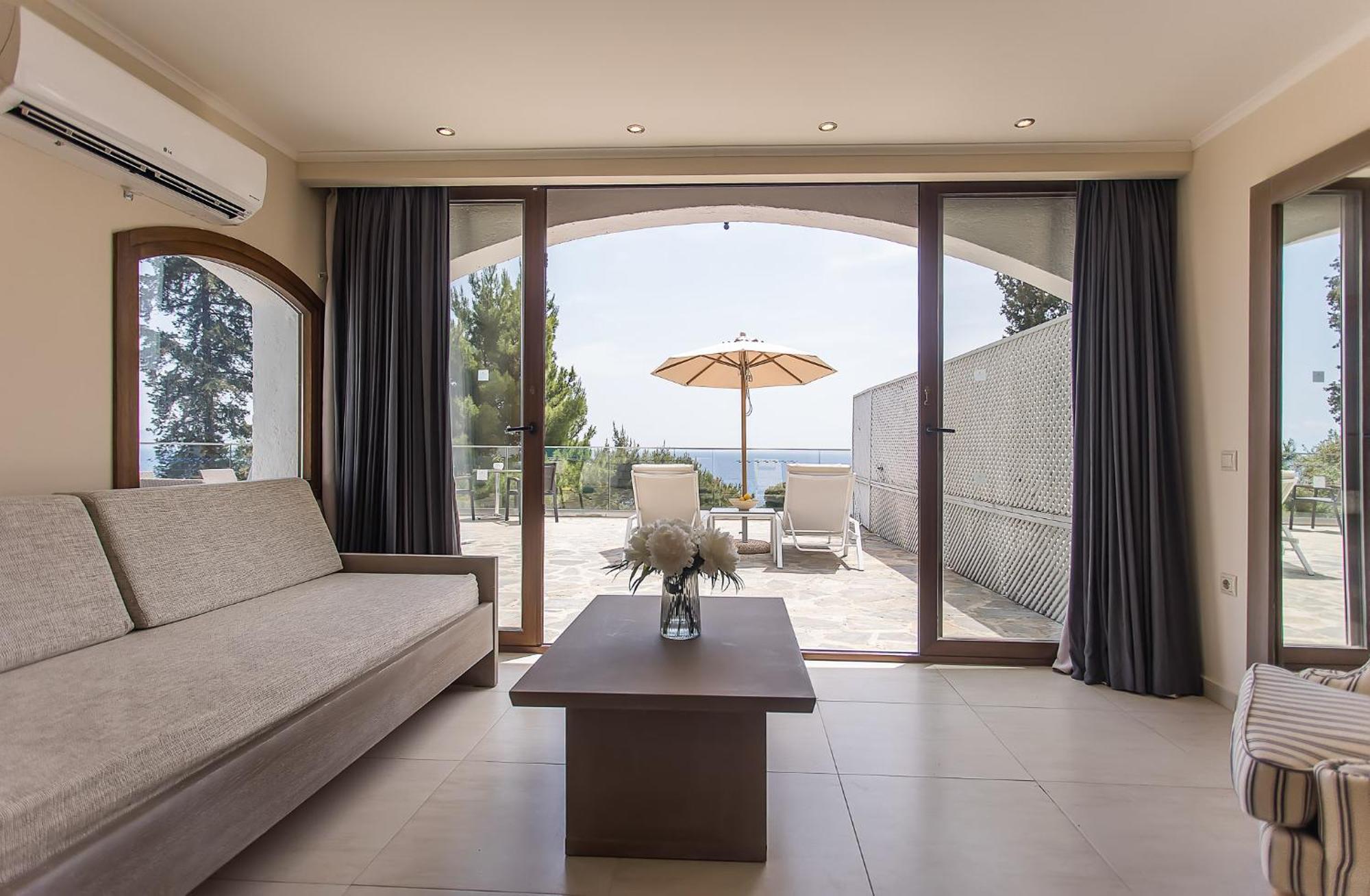Corfu Holiday Palace Perama  Exterior photo Interior of a suite at the hotel