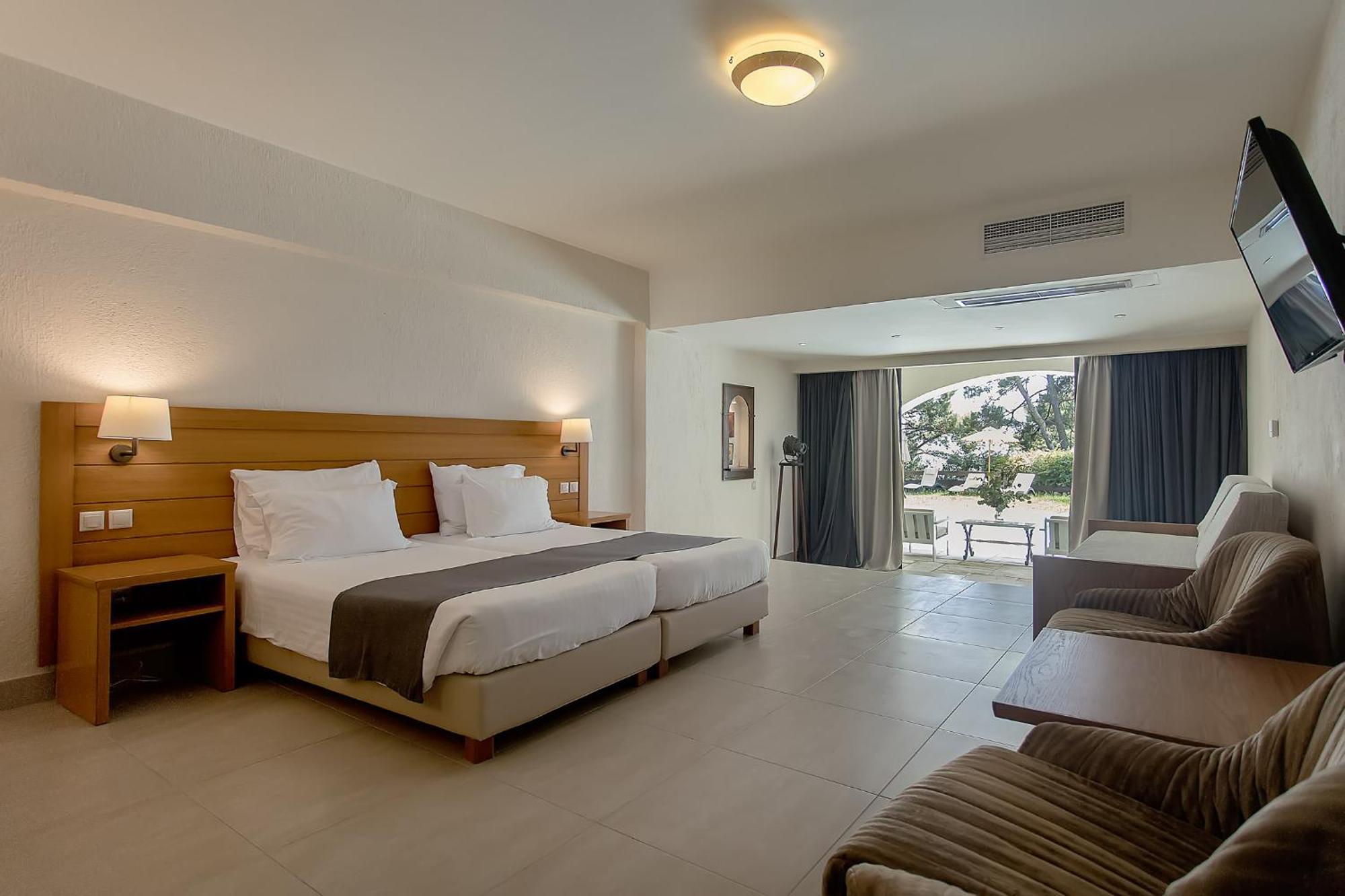 Corfu Holiday Palace Perama  Exterior photo A room at the hotel